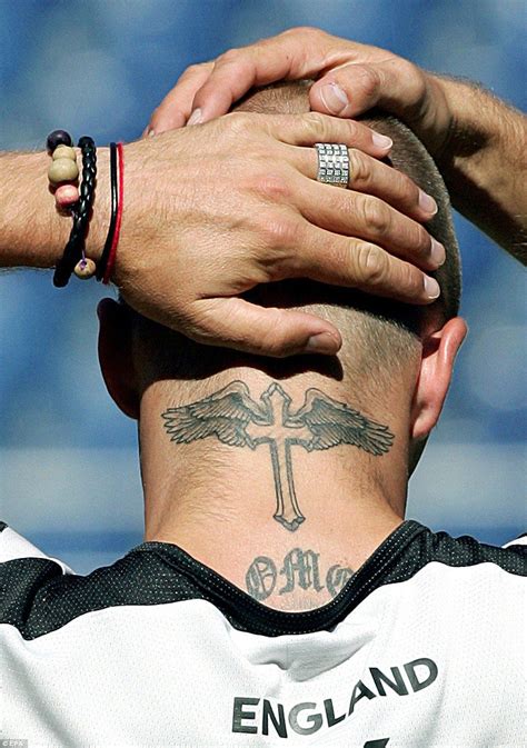 In 2008 david beckham inked this tattoo on his rib which means life and death has determined appointed. A look back at David Beckham's 40 tattoos and their ...