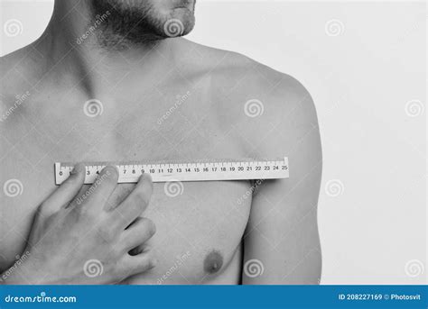Man With Short Wooden Ruler For Measuring Measurement And Size Concept Stock Image Image Of