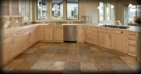 Natural stone tile is an easy way to bring the beauty of the outdoors into your home. Kitchen stone floors Ideas