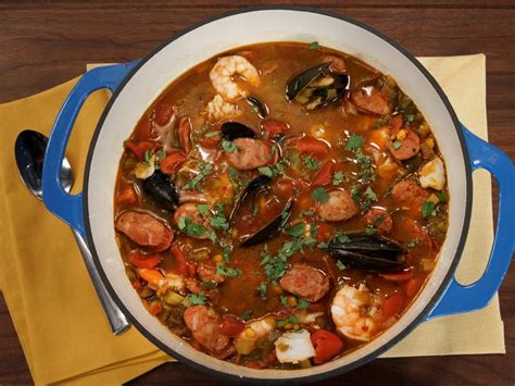 I leave the shells on the shrimp during the cooking process because that's where a lot of the flavor comes from. Quick Sausage and Seafood Stew Recipe | Jamika Pessoa | Food Network
