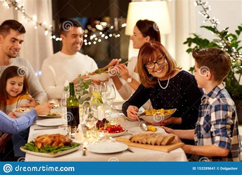 Make your next office party a taco bar or burrito bar! Happy Family Having Dinner Party At Home Stock Image ...