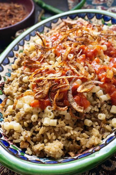 Kushari Egyptian Rice Lentils And Pasta With Spicy Tomato Sauce