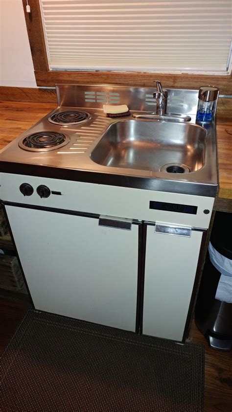This Tiny Homes Combination Sinkstovefridge That Saves A Ton Of