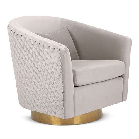 The joyful sensation of sinking back into a sumptuous swivel chair never gets boring. SAFAVIEH - Couture Clara Quilted Swivel Tub Chair in 2020 ...
