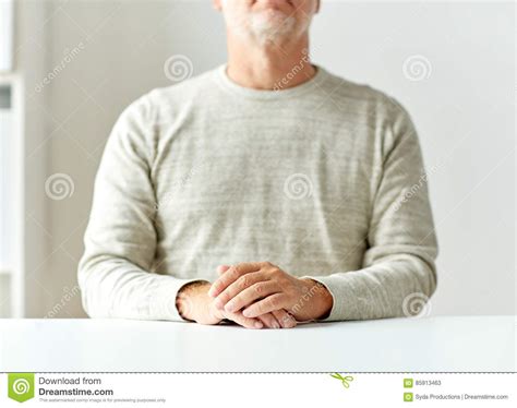 Close Up Of Senior Man Hands On Table Stock Image Image Of Sitting