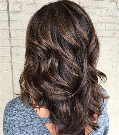 layered brown hair with subtle balayage thick hair styles haircut for thick hair long thick hair