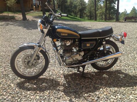 Facture d'achat d'époque + manuel d'utilisateur original (owner's manual). Buy 1977 Yamaha XS650 on 2040-motos