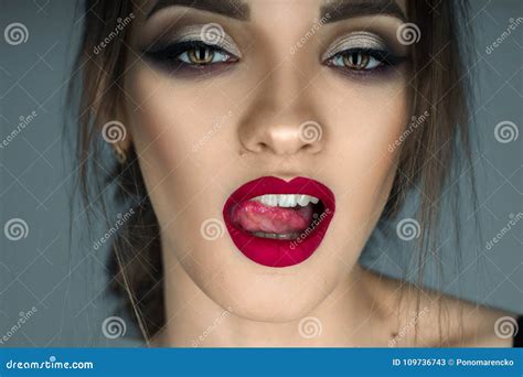 Seductive Girl Licking Her Lips And Looking At The Camera Stock Image Image Of Sensuality