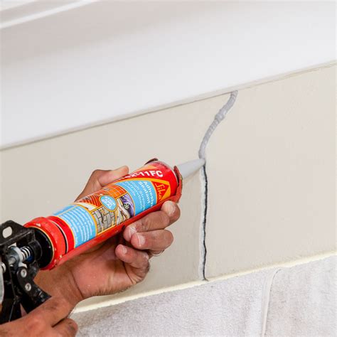 How To Smooth Cracks And Holes In Brick Walls Better Homes And Gardens