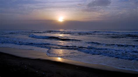 Beach Sea Waves During Sunset Under Black Blue Clouds Sky