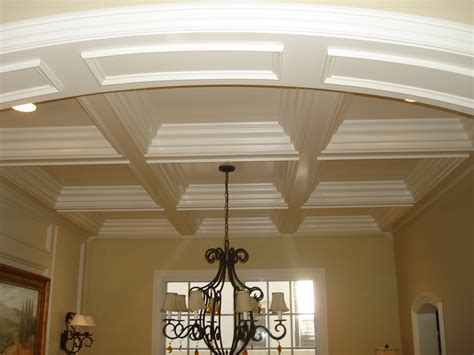 A coffered ceiling is a pattern of indentations or recesses in the overhead surface of an interior. Coffered Ceiling | Appleton Renovations