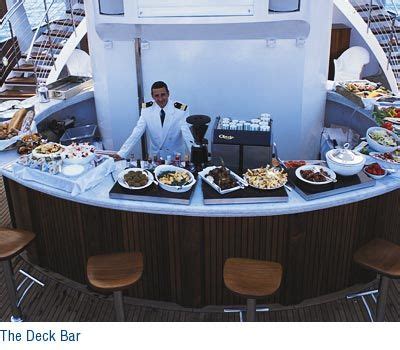 She features an exterior design by azimut and an interior by versace. The delicious deck bar on the Christina O Yacht | Super ...