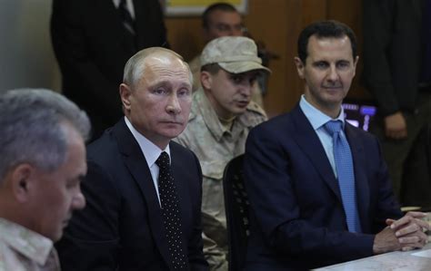 Vladimir Putin In Syria To Declare Victory Hug Bashar Assad And