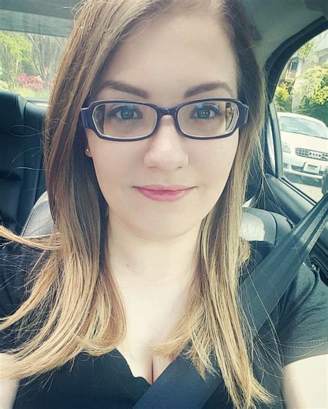Sexy Brunette Girl With Strong Myopic Glasses Takes Seatbelt Selfie A