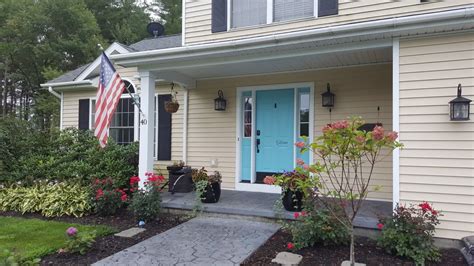 Maybe you would like to learn more about one of these? Sherwin Williams Rapture blue front door, yellow house ...