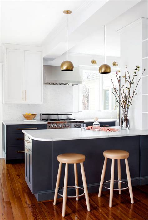 Although the term tuxedo kitchen is new to me, we've been painting kitchens in this style for a few years. A TUXEDO KITCHEN RENOVATION: THE PLAN » Glammed Events