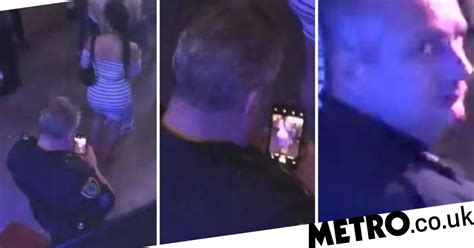 uniformed cop caught taking photos of woman s butt at drake concert metro news