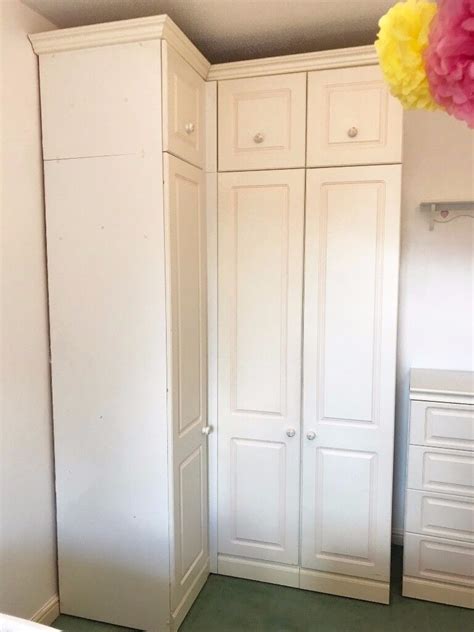 Corner Wardrobe With Handy Top Storage And Matching Chest Of Drawers