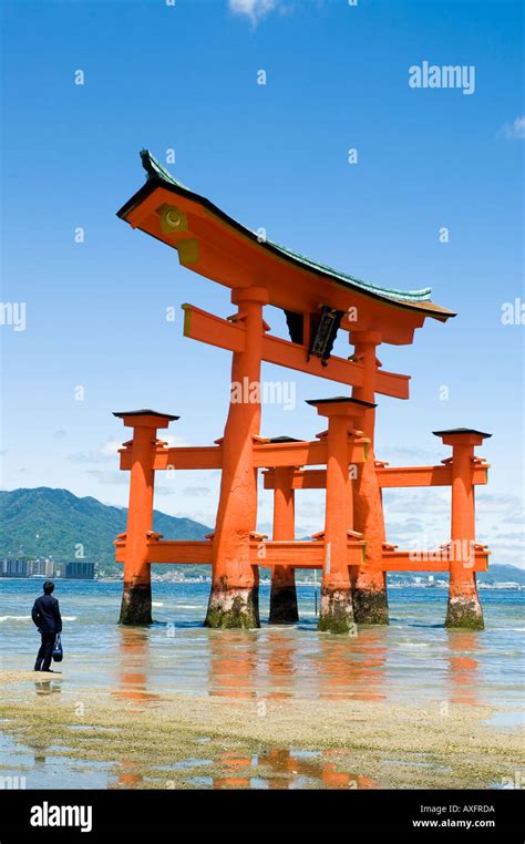 The Floating Torii Gate Of Miyajima Stands In The Bay Near The