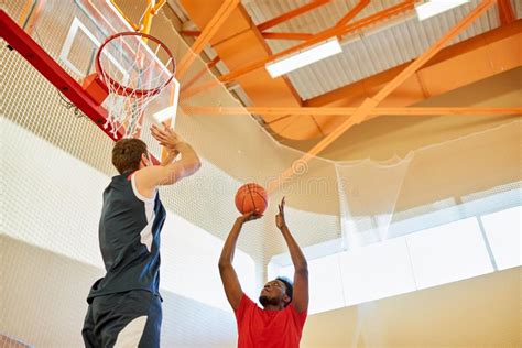 Sporty Player Throwing Ball In Basket Stock Photo Image Of Basketball