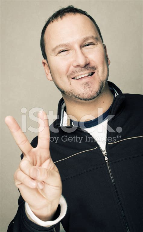 Happy Man Making Peace Sign With Hand Stock Photo Royalty Free