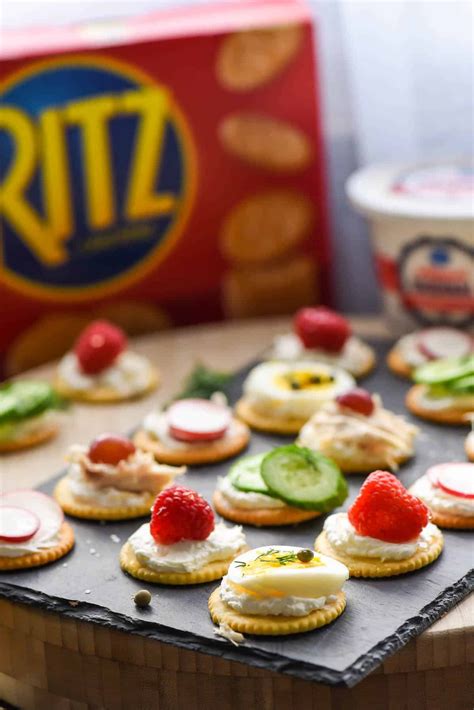 Ritz Crackers Topped With Cream Cheese And Sweet And Savory Toppings