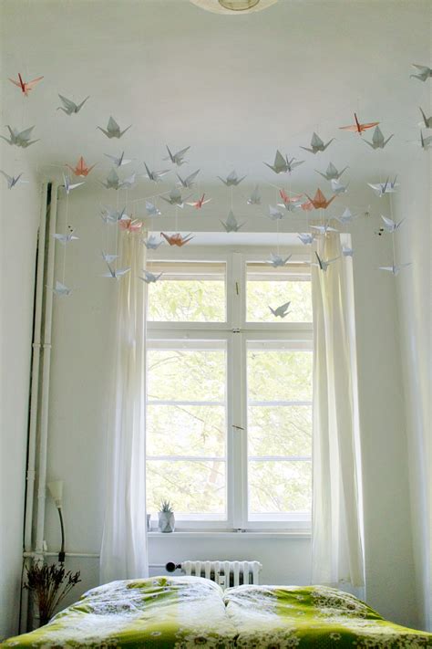 But as always, stores want to make the but just because stores put ridiculous prices on these wall hanging decorations doesn't mean that you can't have a few in your home. DIY | Renters-Friendly Origami Ceiling Decoration