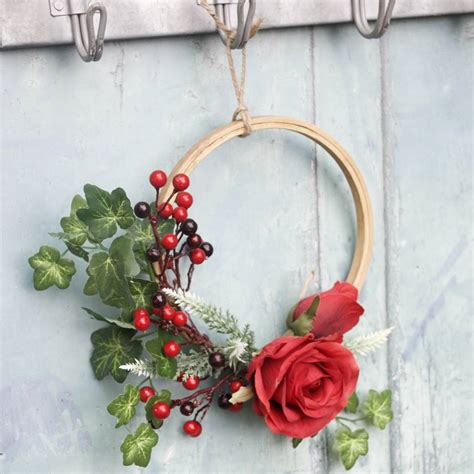It's a geometric wall hanging decoration which you can personalize in lots of different ways, starting with the size and shape of the modules as well as their color. Christmas Decoration Wall Hanging Hoop By Abigail Bryans Designs | notonthehighstreet.com