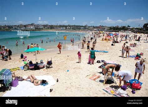 during a warm summer s day crowds of people flock to australia s iconic bondi beach sydney