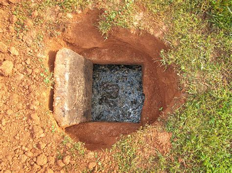 Look closely at the conformation of your yard for any unexplained high spots or low spots that might indicate a buried tank. Septic Tank Stock Photos, Pictures & Royalty-Free Images ...
