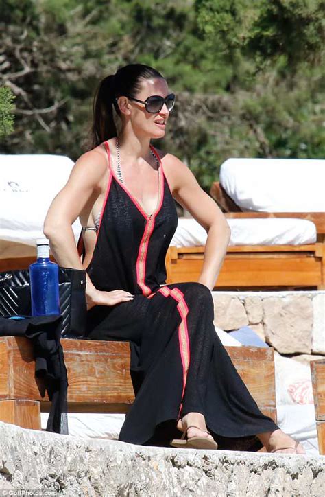 Kirsty Gallacher Flaunts Her Toned Physique In Skimpy Red Crop Top As
