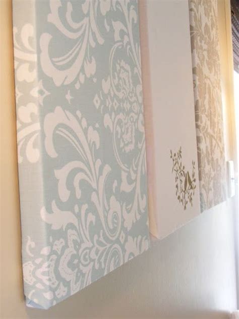 Wrap canvases in fabric to occupy more wall space. Fabric Wall Art
