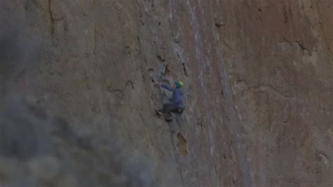 Rock Climber Makes Her Way Up Rock Cliff Stock Video Pond