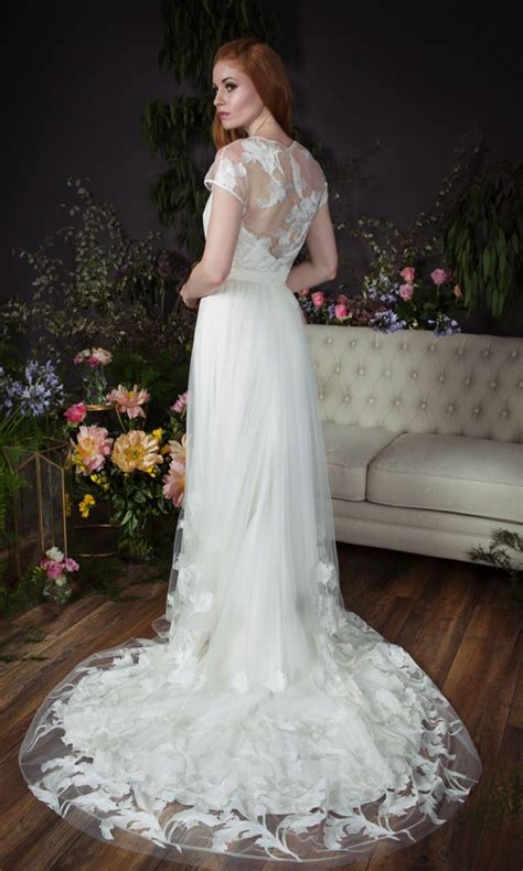 Naomi infuses her background in physics into her passionate work in order to create '…modern, elegant gowns designed for an utterly romantic bride.' Poppy skirt and top, Ebony under-dress, Naomi Neoh lace ...