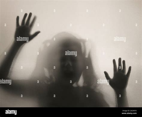 Shadowy Figure Child Behind Glass Horror Background Stock Photo Alamy