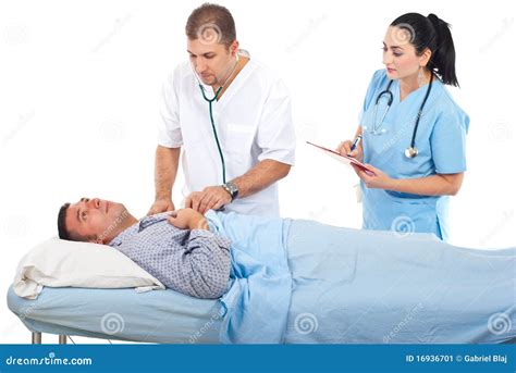 Nurse Assessing Stroke Victim By Raising Arms Stock Image