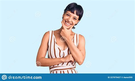 Young Brunette Woman With Short Hair Wearing Summer Outfit Looking