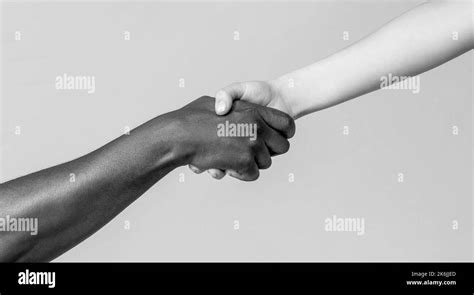 Woman And African Woman Hand Helping Hand Rescue Multiathnic People