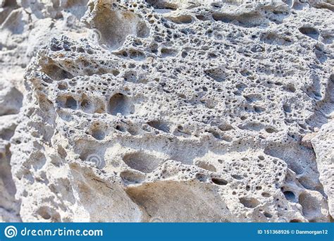 Volcanic Caldera Rocky Limestone Surface In One Of Santorini Beaches