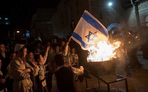 Ultra Orthodox Man Boys Detained For Burning Israeli Flag The Times Of Israel