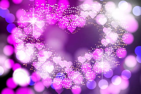 Abstract Heart Blurred Light Bokeh Lights And Glitter Background