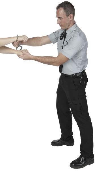 Security Guard Handcuffing Suspect Free Photo Download Freeimages
