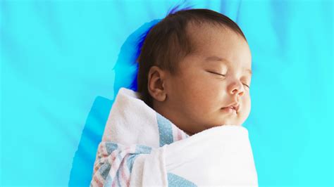 Is Swaddling Your Newborn Even Safe? Dangers & Tips for Parents - SheKnows