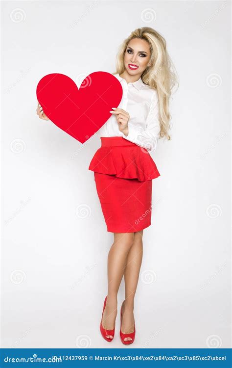 Beautiful Sexy Elegant Blonde Woman Holding A Red Valentine Heart Stock Image Image Of