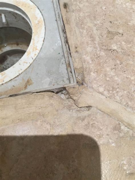 Shower How Can I Repair Cracked Stones Around A Drain In