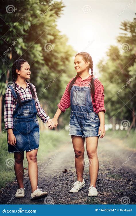 Two Girls Walking Along A Forest Stock Image Image Of Park Summer