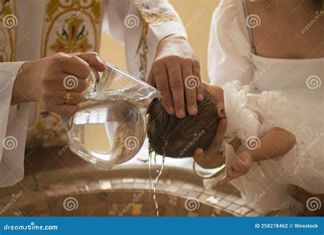 Closeup Shot Of Catholic Baptism In Philippines Stock Photo Image Of