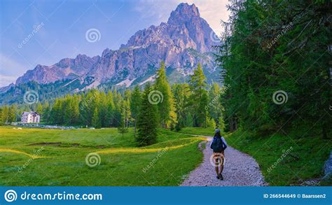 Woman Hiking In The Italian Dolomites Girl Hiking To Lago Di Sorapis