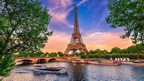 Paris Eiffel Tower And Trees On Sides And Lake And Boats On Front With