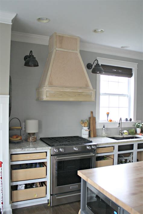 Wood range hood covers are quite popular, especially in farmhouse homes. A DIY(ish) Wood Vent Hood from Thrifty Decor Chick